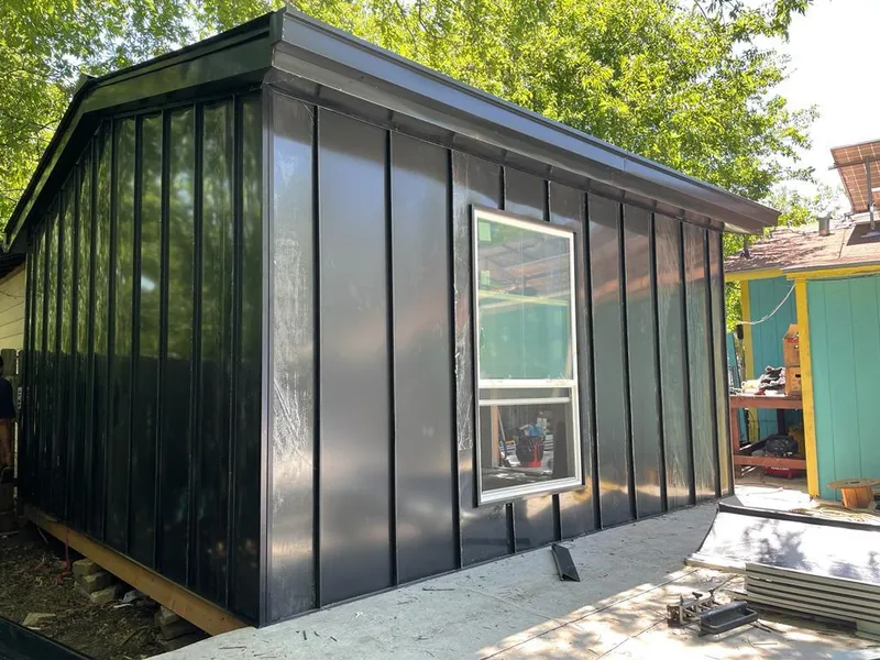 Black standing seam metal wall panels for Metal Roof Installation in North Logan
