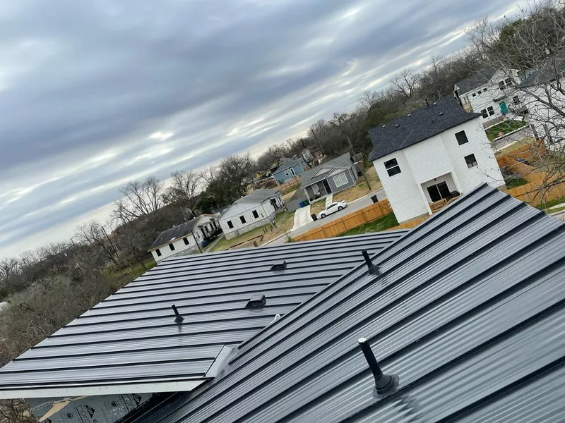 Standing seam metal roof panels with vents for Skylight Repair in North Logan